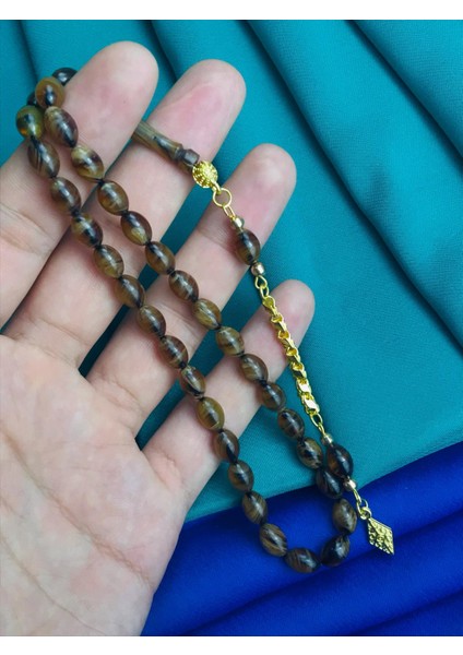 Kahverengi Aykırı Tonlu Sıkma Kehribar Tesbih Beyzi Kesim Altın Rodajlı Püskül Efe Boy
