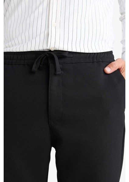 Regular Fit Normal Kesim Kumaş Pantolon Cepli Düz Paça E2937AX24WN indirimleri