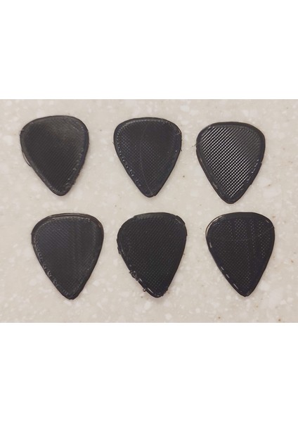 0,4 Mm'den 2,0 Mm'ye Kadar Çeşitli Kalınlıkta Gitar Penaları (Plastik Aparattır!!!) modelleri