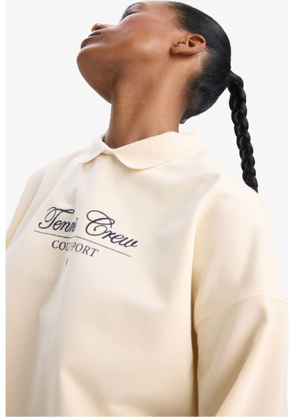 DeFacto Fit Oversize Geniş Kalıp Polo Yaka Slogan Baskılı Sporcu Sweatshirt D7133AX25SP fırsatları