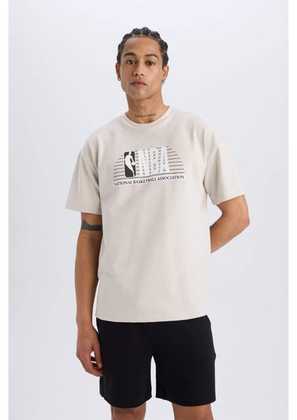 DeFactoFit NBA Wordmark Oversize Geniş Kalıp Bisiklet Yaka Sporcu Pike Kısa Kollu Tişört D6121AX25SP fırsatları