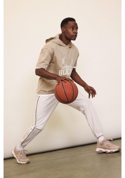 NBA Milwaukee Bucks Sporcu Jogger Eşofman Altı Standart Fit Cepli Esnek Bantlı Paça Skuba Dalgıç Kumaş D6725AX25SP fiyatları
