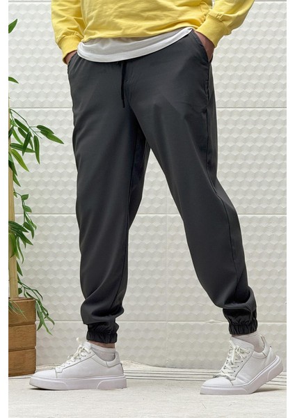 Erkek Full Likralı Paraşüt Kumaş Lastikli Jogger Pantolon indirimleri