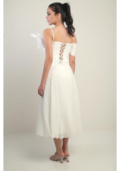 Kadın Ip Askılı Arkası Bağcıklı Düşük Tek Kol Tüy Broşlu Astarlı Pıtırcık Kumaş Elbise fırsatları