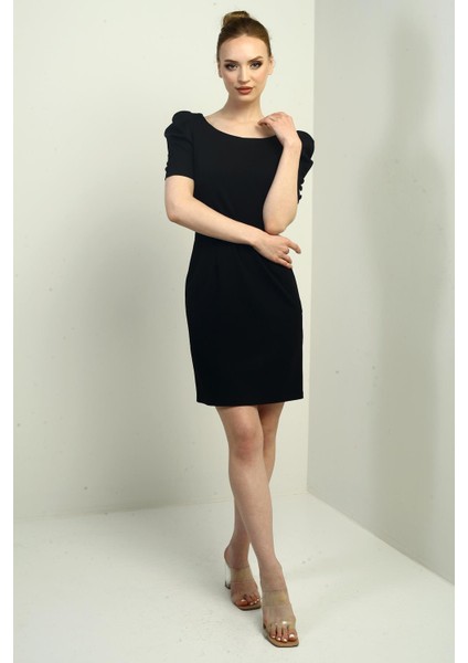 Kadın Kayık Yaka Kolları Düğmeli Pileli Arkası Fermuarlı Elbise modelleri