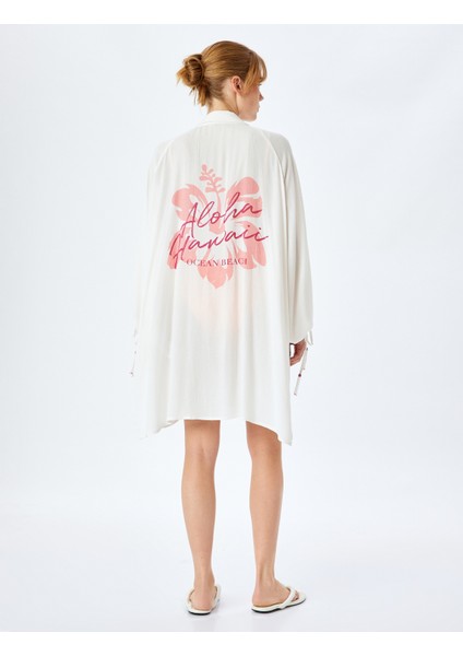 Düğmeli Uzun Kollu Arkası Baskı Detaylı Viskon Plaj Elbisesi fırsatları