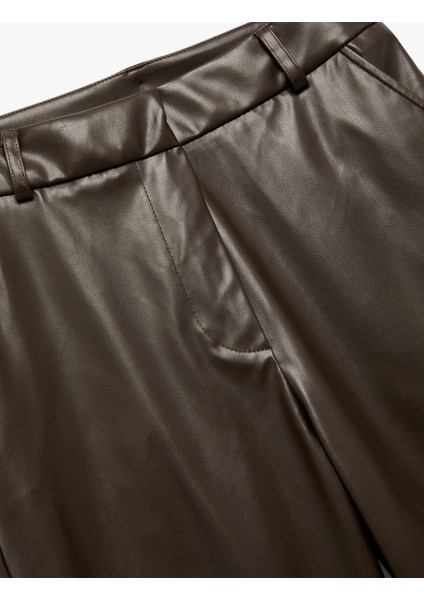 Cepli Düz Bol Paça Suni Deri Pantolon modelleri