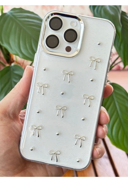 Apple iPhone 16 Pro Kılıf Fiyonk Desenli Şeffaf Simli Gümüş Kamera Çıkıntılı Parlak Kapak indirimleri