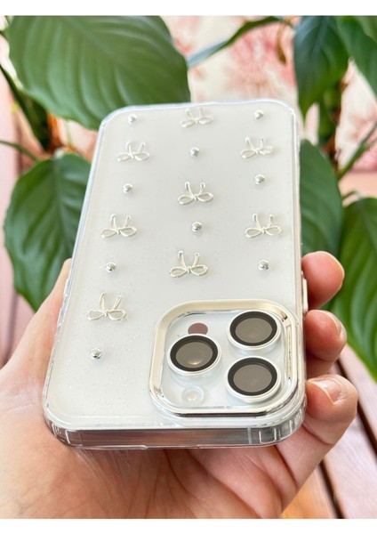 Apple iPhone 15 Pro Kılıf Fiyonk Desenli Şeffaf Simli Gümüş Kamera Çıkıntılı Parlak Kapak