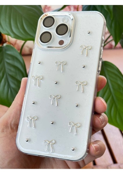 Apple iPhone 12 Pro Max Kılıf Fiyonk Desenli Şeffaf Simli Gümüş Kamera Çıkıntılı Parlak Kapak