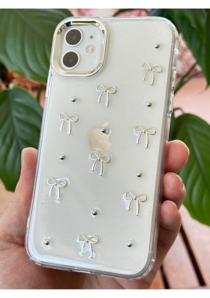Apple iPhone 12/12 Pro Kılıf Fiyonk Desenli Şeffaf Simli Gümüş Kamera Çıkıntılı Parlak Kapak