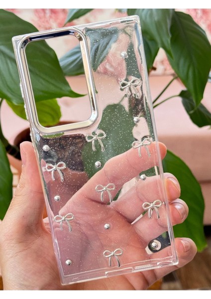 Samsung Galaxy S25 Ultra Uyumlu Kılıf Fiyonk Desenli Şeffaf Simli Gümüş Kamera Çıkıntılı Parlak Kapak fırsatları