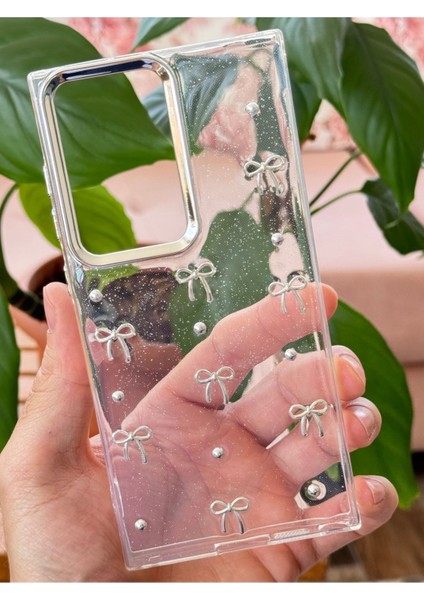 Samsung Galaxy S24 Ultra Uyumlu Kılıf Fiyonk Desenli Şeffaf Simli Gümüş Kamera Çıkıntılı Parlak Kapak fiyatları