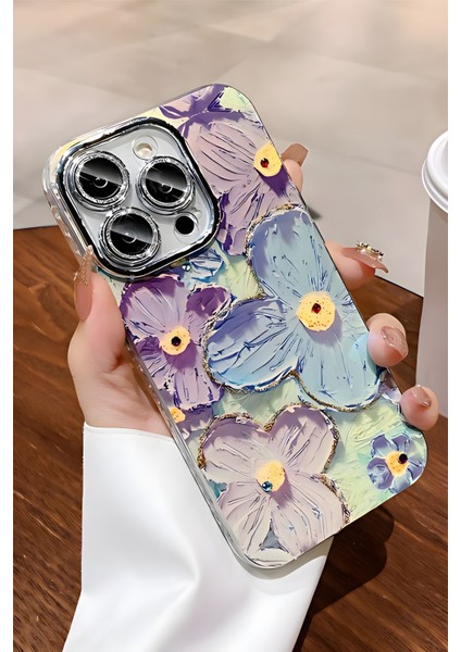 Apple iPhone 16 Pro Max Kılıf Renk Değiştiren Taşlı Kamera Lens Korumalı Mavi Çiçek Desenli Darbe Emici