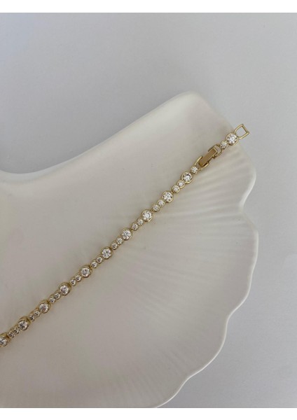 Xuping Özel Seri Yuvarlak Asimetrik Taşlı Su Yolu Gold Bileklik