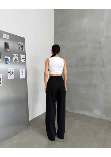 Kadın Arkası Lastikli Dabıl Kumaş Palazzo Pantolon – Yüksek Bel, Bol Paça, Rahat ve Şık modelleri