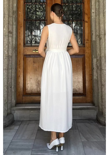 Kruvaze Yaka Kuşaklı Sıfır Kol Elbise P-00017759 modelleri