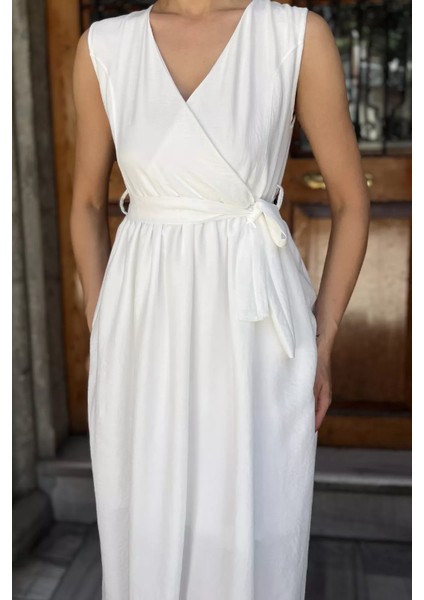 Kruvaze Yaka Kuşaklı Sıfır Kol Elbise P-00017759 fırsatları