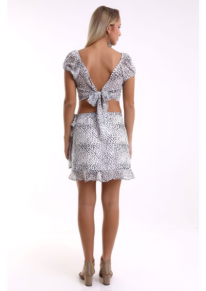 Kadın Alt Üst Takım Sırt Dekolteli Kısa Kollu Arkadan Bağlamalı Bluz Mini Anvelop Etek 7002-451-0001 fırsatları