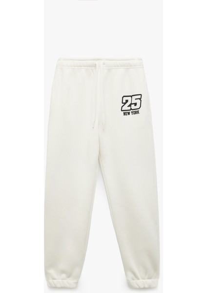 Üç Iplik Şardonlu Cepli Bağcıklı Baskılı Rahat Kalıp Jogger Eşofman Altı modelleri