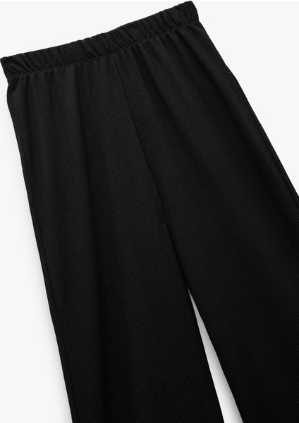 Beli Lastikli Bürümcük Geniş Paça Pantolon fırsatları