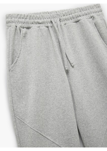 Şardonlu Dikiş Detaylı Beli Bağcıklı Cepli Rahat Kalıp Jogger Eşofman Altı indirimleri