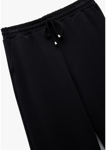 Modal Karışımlı Normal Bel Cepli Geniş Düz Paça Eşofman Altı indirimleri