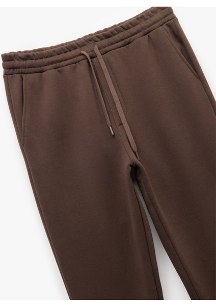 Beli Bağcıklı Şardonlu Cep Detaylı Jogger Eşofman Altı indirimleri