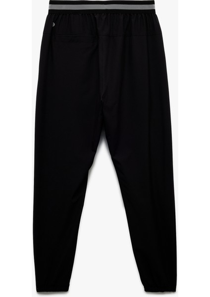 Beli Lastikli Paraşüt Kumaş Şerit Detaylı Jogger Spor Eşofman Altı fiyatları