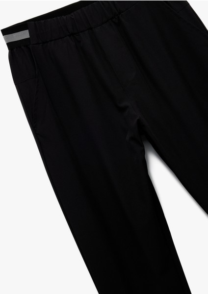 Beli Lastikli Paraşüt Kumaş Şerit Detaylı Jogger Spor Eşofman Altı modelleri