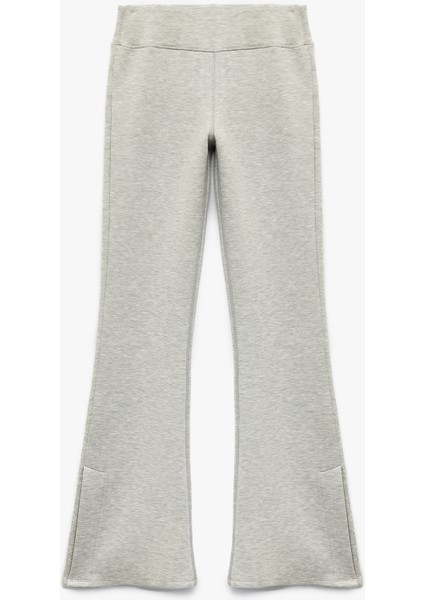 Slim Fit Paçaları Yandan Yırtmaç Detaylı Ispanyol Paça Tayt modelleri