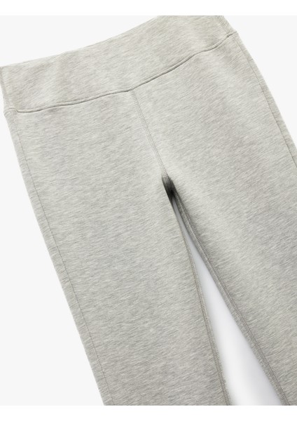 Slim Fit Paçaları Yandan Yırtmaç Detaylı Ispanyol Paça Tayt indirimleri