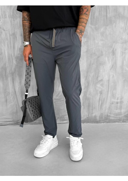 Erkek Beli Lastikli Tecno Kumaş Slim Fit Pantolon Füme fiyatları