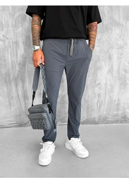 Erkek Beli Lastikli Tecno Kumaş Slim Fit Pantolon Füme modelleri