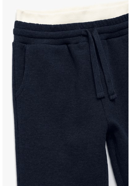 Ribanalı Beli Bağlamalı Cepli Şardonlu Basic Eşofman Altı modelleri