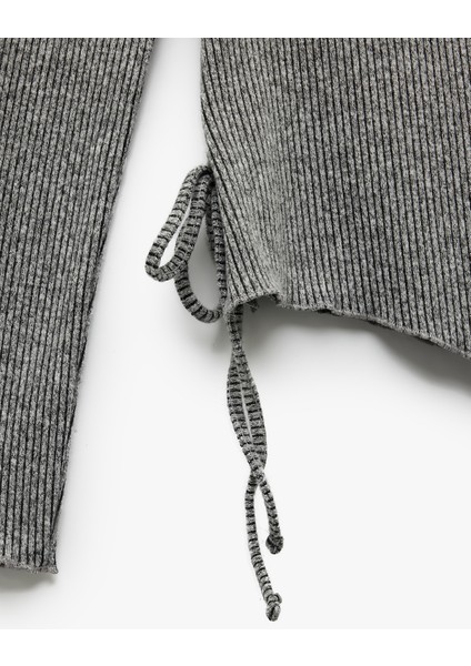 Uzun Kollu Dik Yaka Asimetrik Bağlama Detaylı Bluz indirimleri