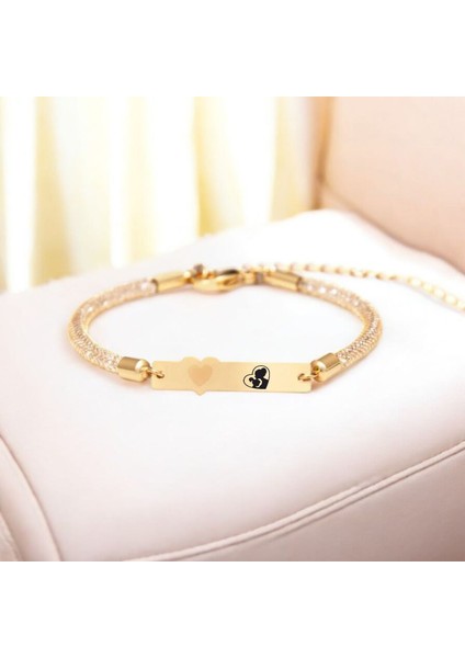 Anne Sevgisi Temalı Hasır Kordonlu Kalp Motifli 14 Ayar Altın Plakalı Hediye Bileklik-457SEMBOL