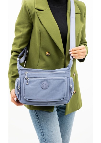 Kadın Çok Gözlü Suya Dayanıklı Krinkıl Kumaş Mavi Renkli Ayarlanabilir Çapraz Askılı Omuz Çantası fiyatları