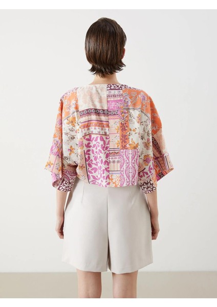 Lcw Vision Kruvaze Yaka Desenli Modal Karışımlı Crop Bluz (S5) fırsatları