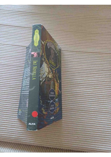 H.p. Lovecraft'ın Iki Gizemli Novellası Alfa Yayınevi Tarafından Basılmıştır. Kitap, Esrarengiz Hikayeler Içerir. iki Novella Inssmouth Üzerindeki Gölge - Zamanın Uçurumunda 1,basim fiyatları