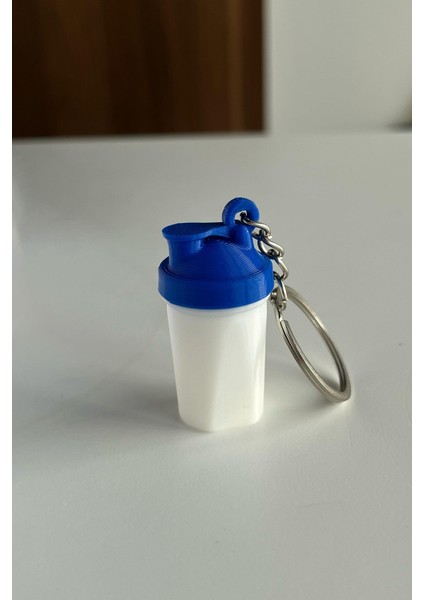 2 Adet Protein Shaker Anahtarlık Sallanınca Ses Çıkaran Sporcu Anahtarlık - Sarı Turuncu-Beyaz Mavi fiyatları