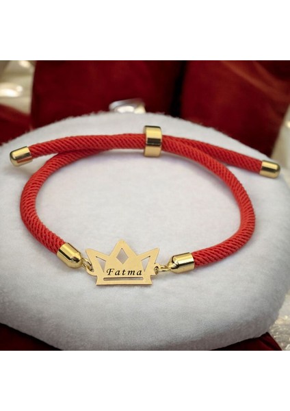 Fatma İsmine Özel Turuncu İpek Örgülü Taç Motifli 14 Ayar Altın Plakalı Hediye Bileklik-501 İsim fiyatları