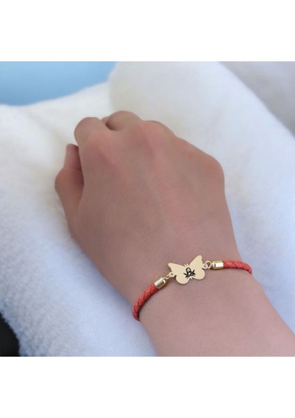 Hz Ali Temalı Kelebek Motifli 14 Ayar Altın Plakalı Turuncu Derili Hediye Bileklik-502 Sembol