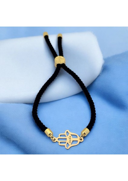 Seda İsmine Özel Siyah İpek Örgülü Hamsa Motifli 14 Ayar Altın Plakalı Hediye Bileklik-509 İsim fiyatları