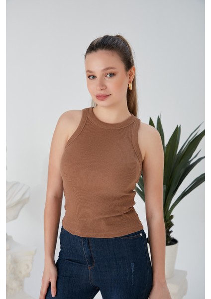 Bej Zargo Model Fitted/vücuda Oturan Geniş Biyeli Halter Yaka Fitilli Esnek Örme Crop Bluz fiyatları