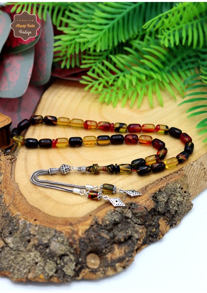 Hareli Sarı Siyah Kapsül Kesim Gümüş Püsküllü Ateş Kehribar Tesbih 201024419 modelleri