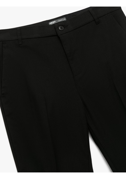 Düğmeli Cep Detaylı Slim Fit Kumaş Pantolon indirimleri