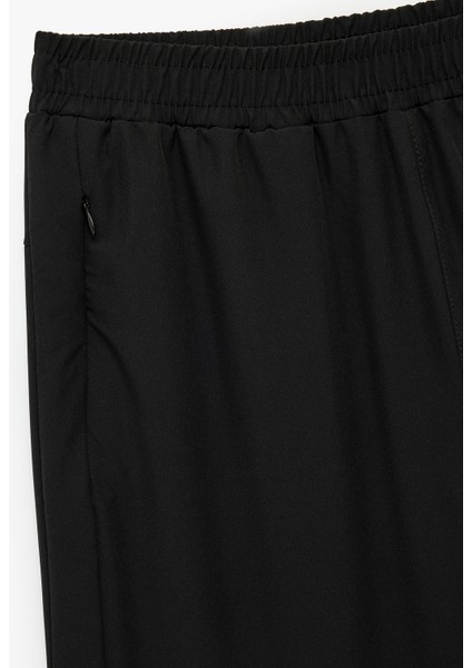 Yüksek Bel Rahat Kesim Fermuarlı Cepli Jogger Spor Eşofman Altı modelleri