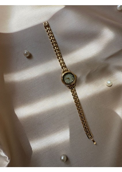 Retro Minimal Boncuk Kordon Vintage Kadın Kol Saati Içi Yeşil modelleri