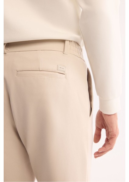 Erkek Bej Slim Fit Kırışmaz Hızlı Kuruyan Beli Lastikli Ekstra Esnek Teknik Kumaş Pantolon A42Y3065 fırsatları